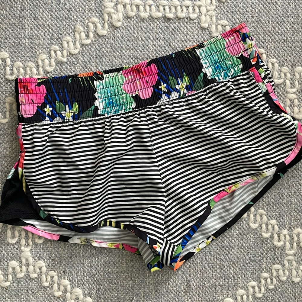 Tropical shorty surf shorts